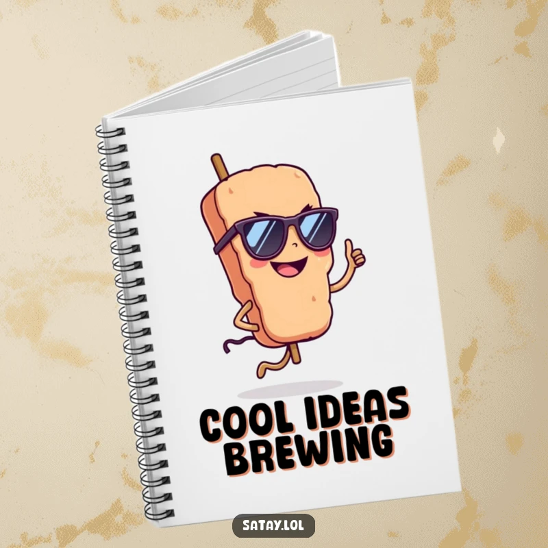 Funny satay skewer wearing sunglasses on a notebook, hopping with a confident grin, perfect for jotting down cool ideas.