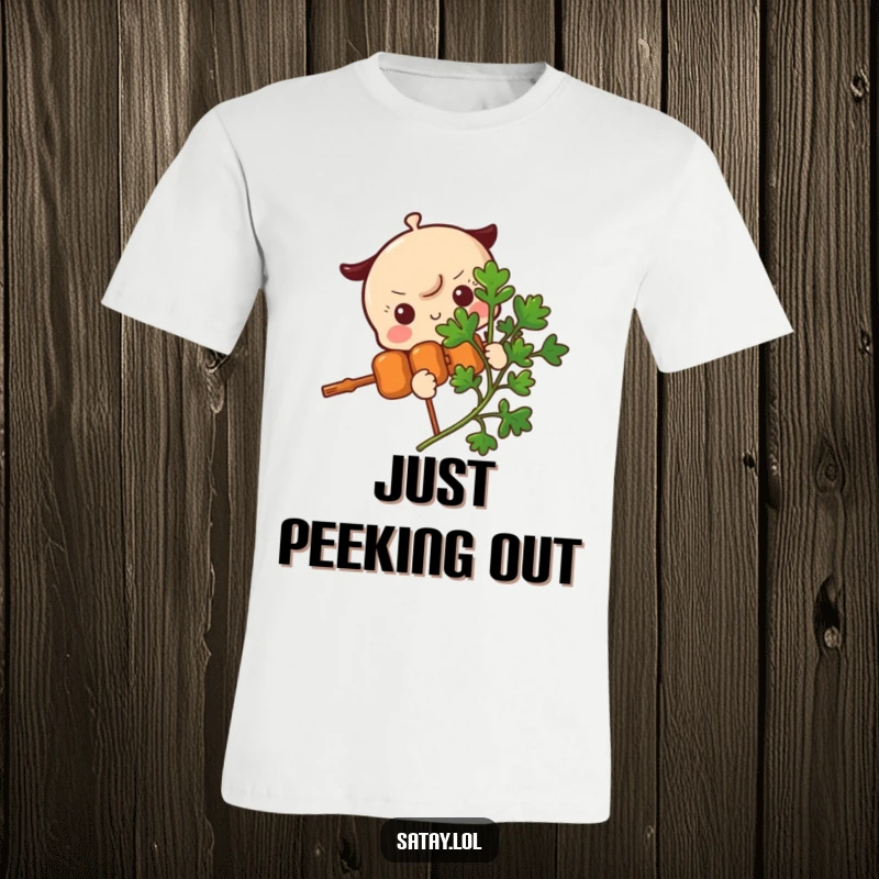 Funny Satay Skewer T-Shirt illustrating a skewer character peeking out from behind a parsley sprig, exuding a cute and mischievous vibe.