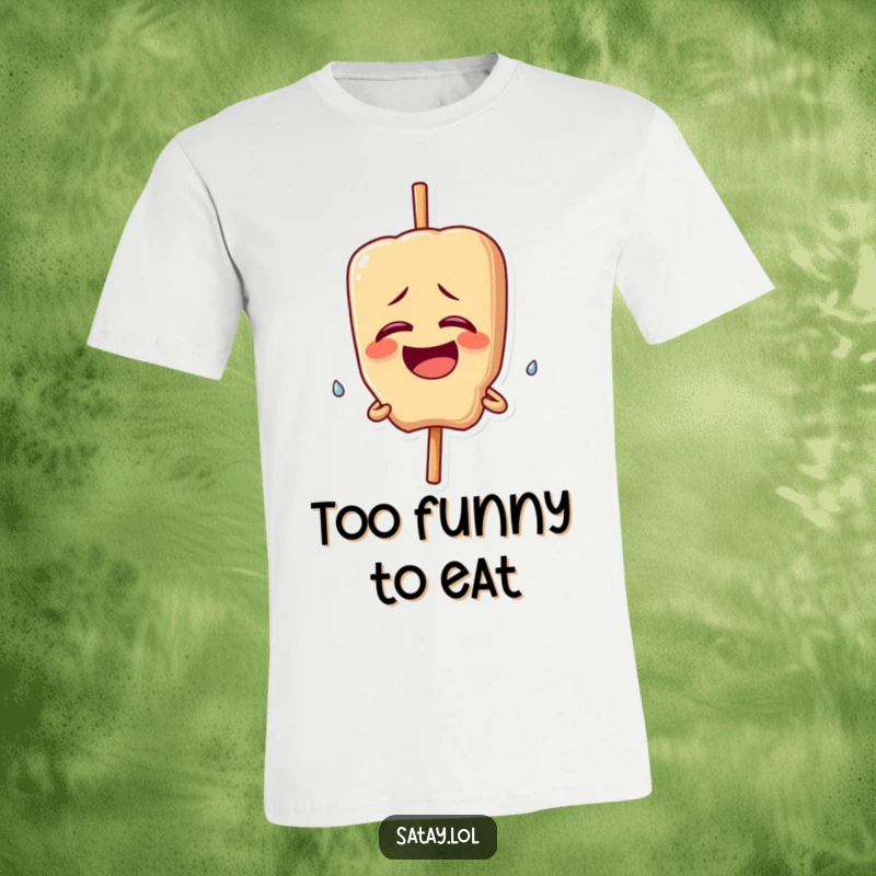 Funny t-shirt featuring a satay skewer character giggling uncontrollably, with a single happy tear streaming down its face.